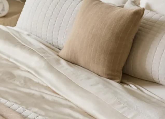 cozy earth sale sheets and pillows on bed