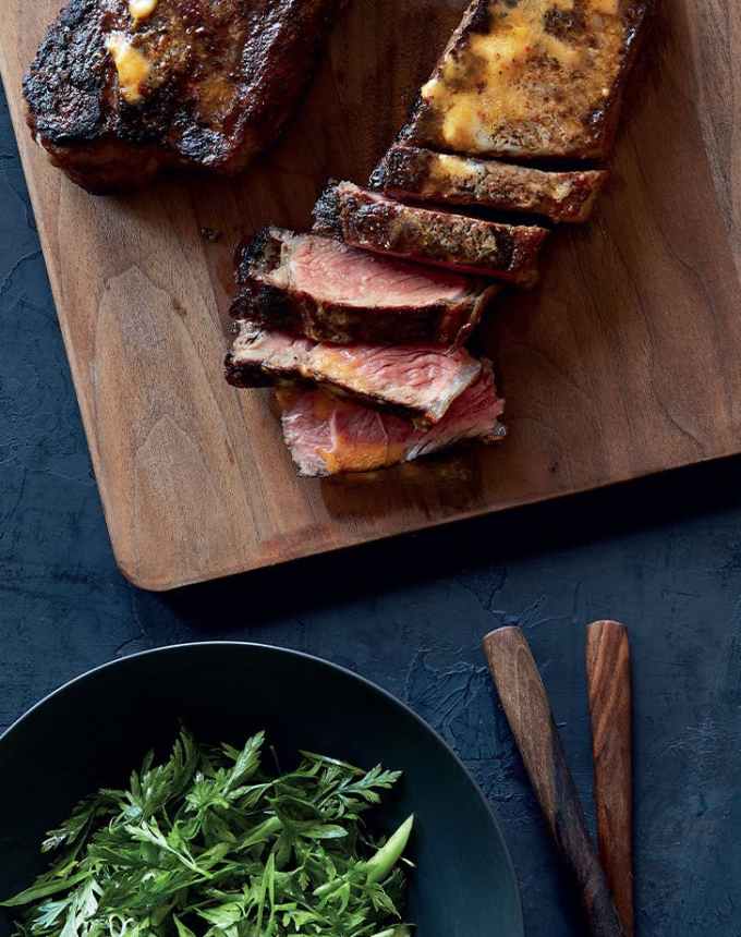 birthday dinner ideas: Antoni Porowski’s Strip Steak with Harissa Butter and Parsley Salad