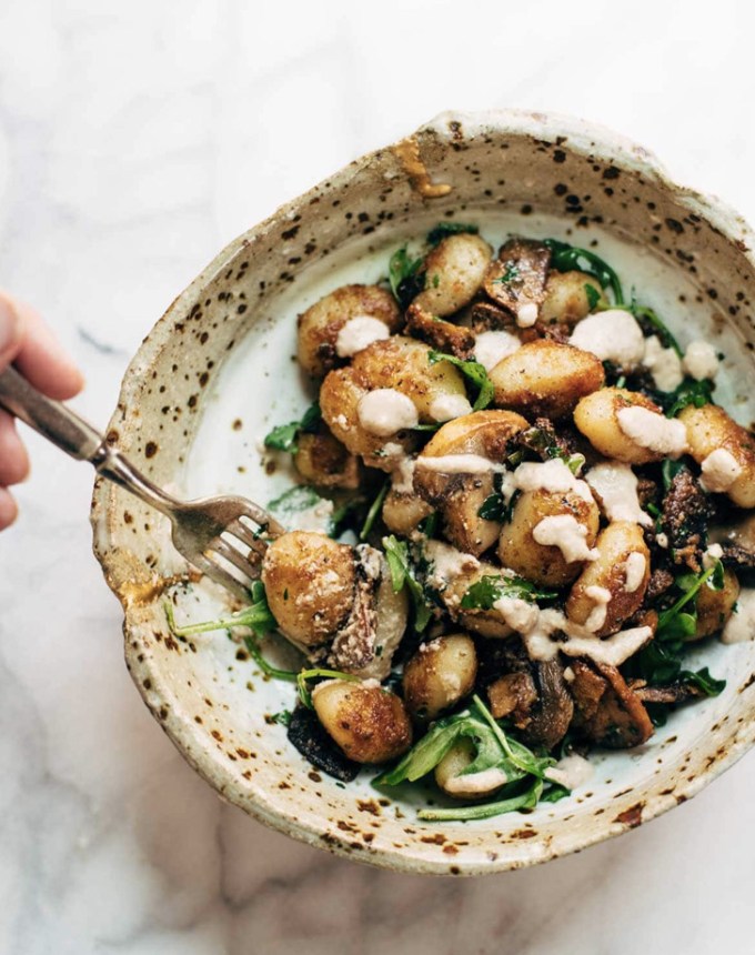easy gnocchi recipes: mushroom gnocchi with arugula and walnut pesto
