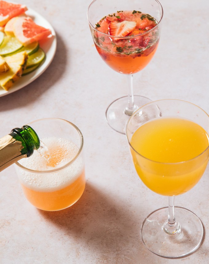 mimosa bar with paloma, tropical and strawberry-basil mimosas