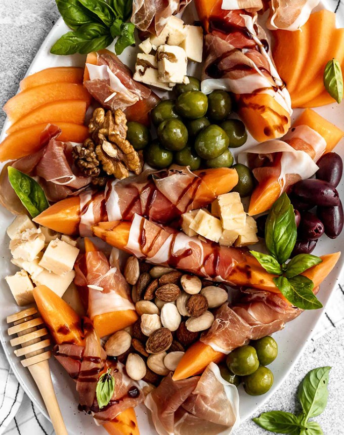 prosciutto-wrapped cantaloupe with olives